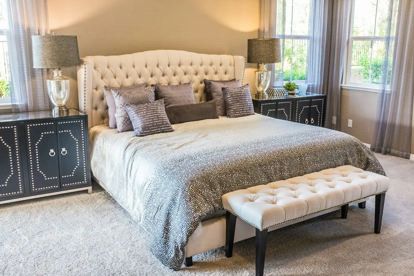 Calm modern bedroom interior with soft bedding